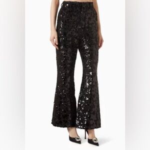 Elliatt wide-leg pants, with gemstone buttons and glistening sequins.